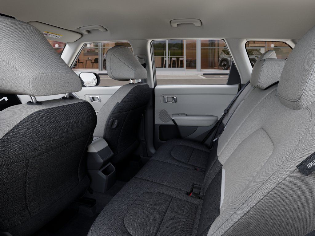 New 2027 Ivory Silver Kia LX image 18