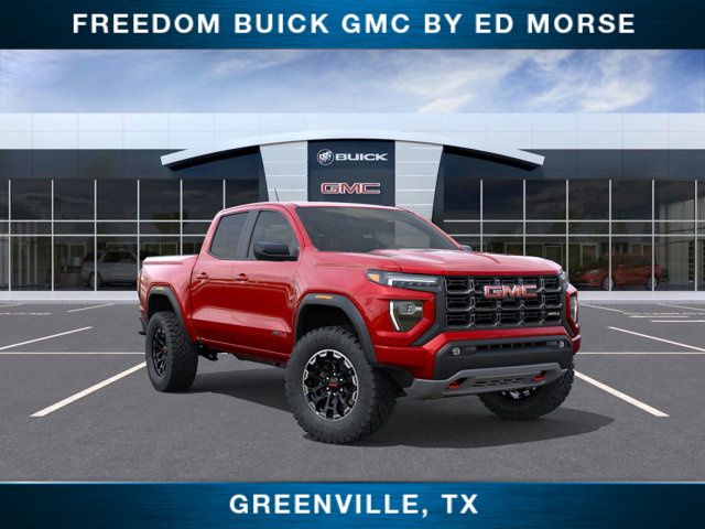 Volcanic Red Tintcoat 2026 GMC Canyon AT4 Crew Cab 4WD Pickup Truck Four-Wheel Drive 8-Speed Automatic