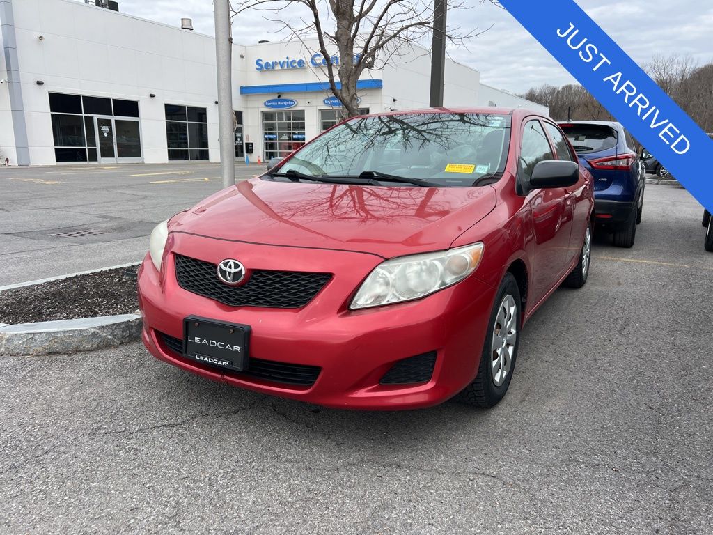 Barcelona Red Metallic 2010 Toyota Corolla LE Sedan Front-Wheel Drive 5-Speed Manual