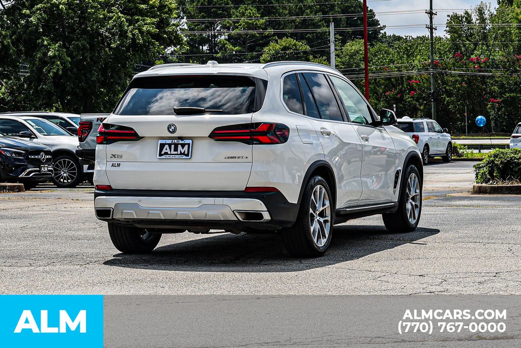 Used 2025 White BMW xDrive50e image 6
