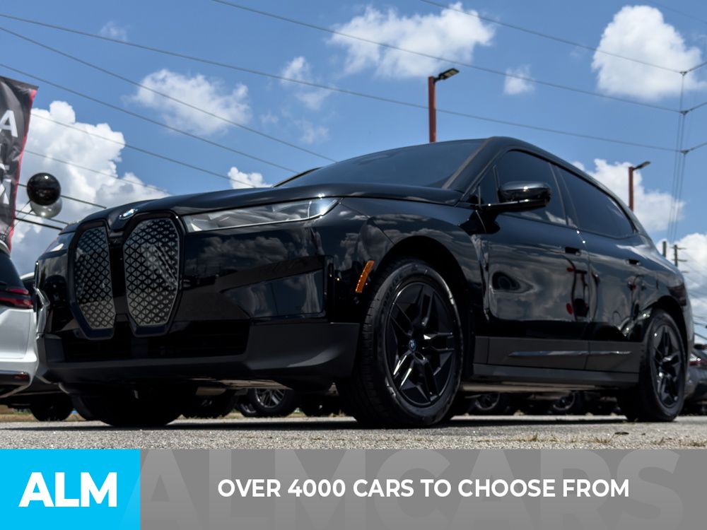 Used 2024 Black BMW xDrive50 image 2
