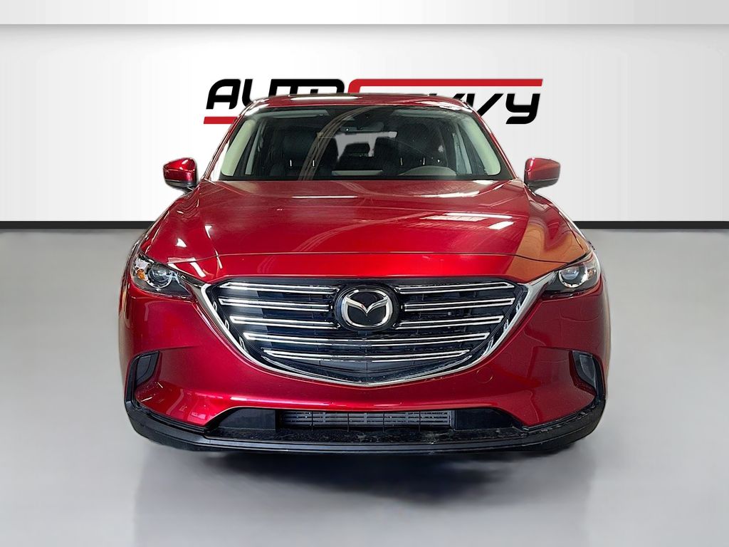 Used 2023 Red Mazda Touring Plus image 2
