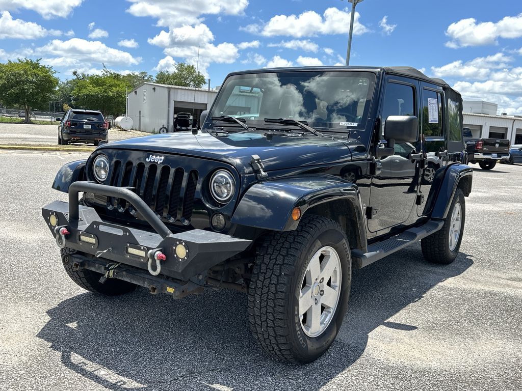 Black Clearcoat 2010 Jeep Wrangler Unlimited Sahara 4WD SUV / Crossover Four-Wheel Drive 6-Speed Manual