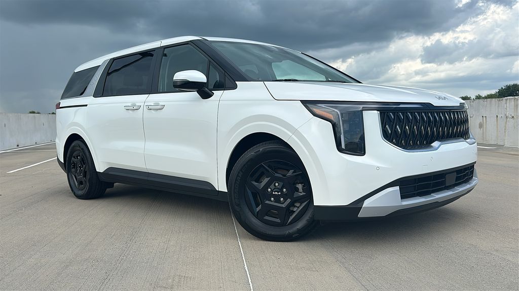2026 Kia Carnival LXS White at DeMontrond Automotive Group