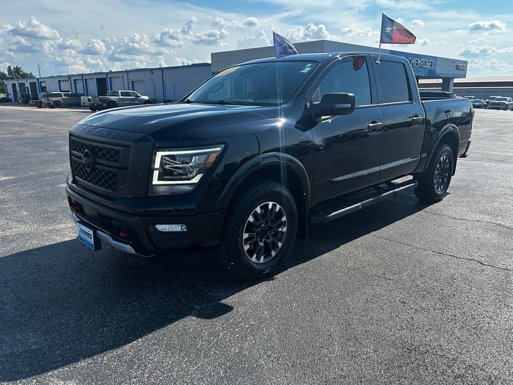 Super Black 2023 Nissan Titan Pickup Truck Four-Wheel Drive 9-Speed Automatic