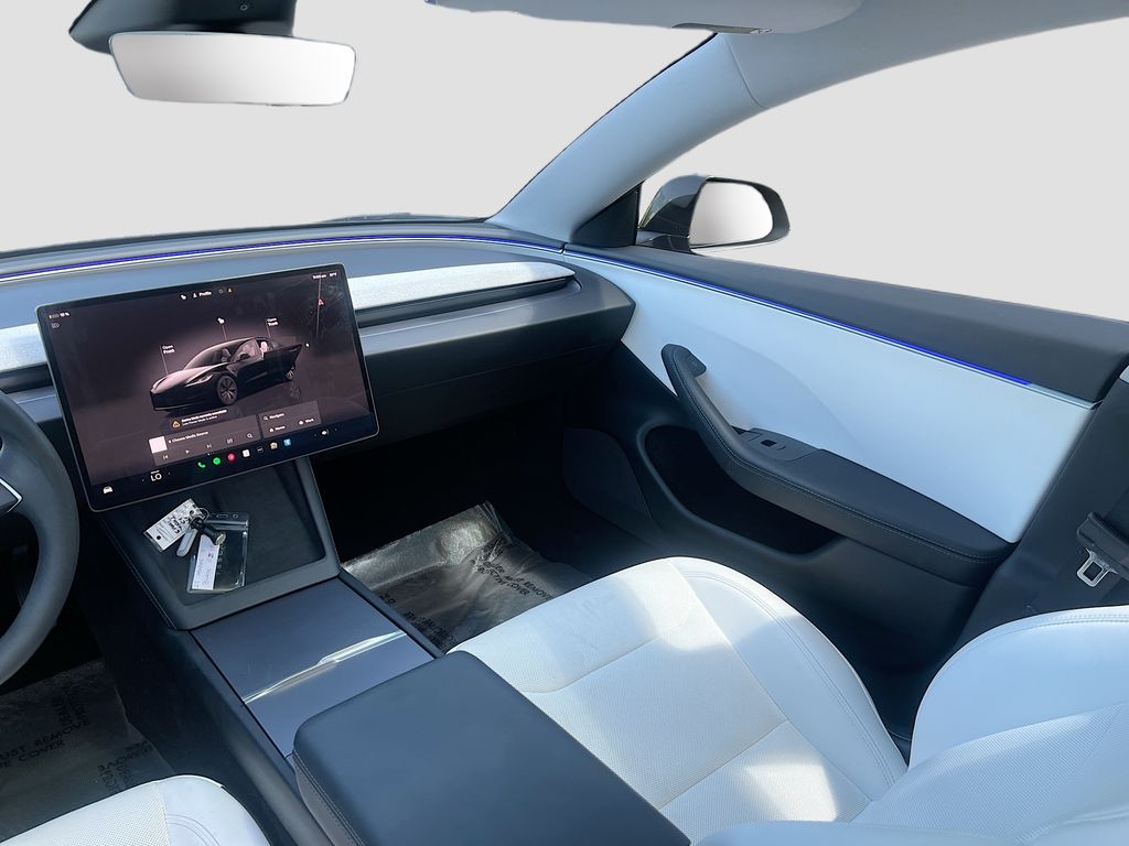 2025 Tesla Model 3 Long Range Black at AutoSavvy Houston Northwest