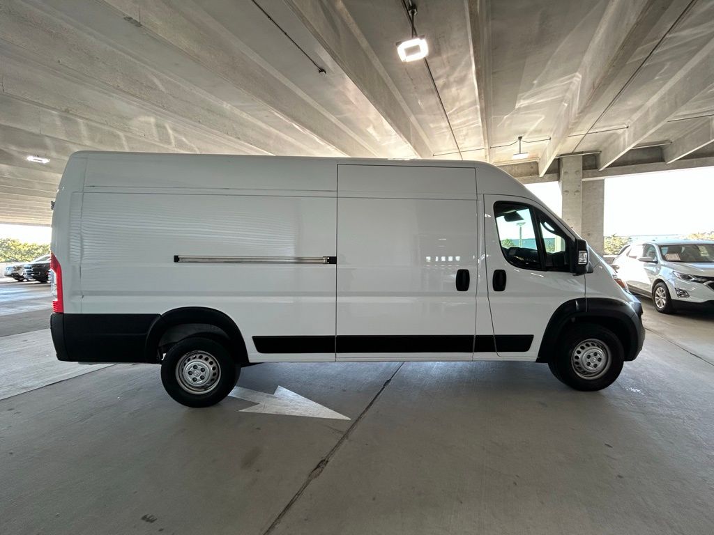 Used 2024 Bright White Clearcoat Ram High Roof image 4