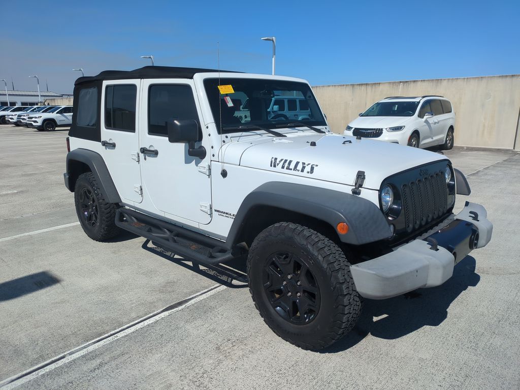 Used 2017 Jeep Wrangler Unlimited Willys Wheeler with VIN 1C4HJWDG6HL675257 for sale in Tamarac, FL