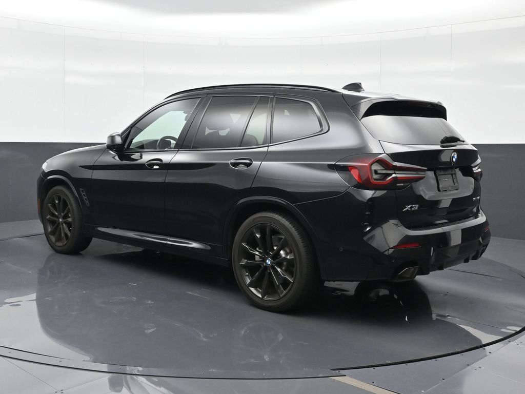 Used 2024 Black BMW sDrive30i image 2