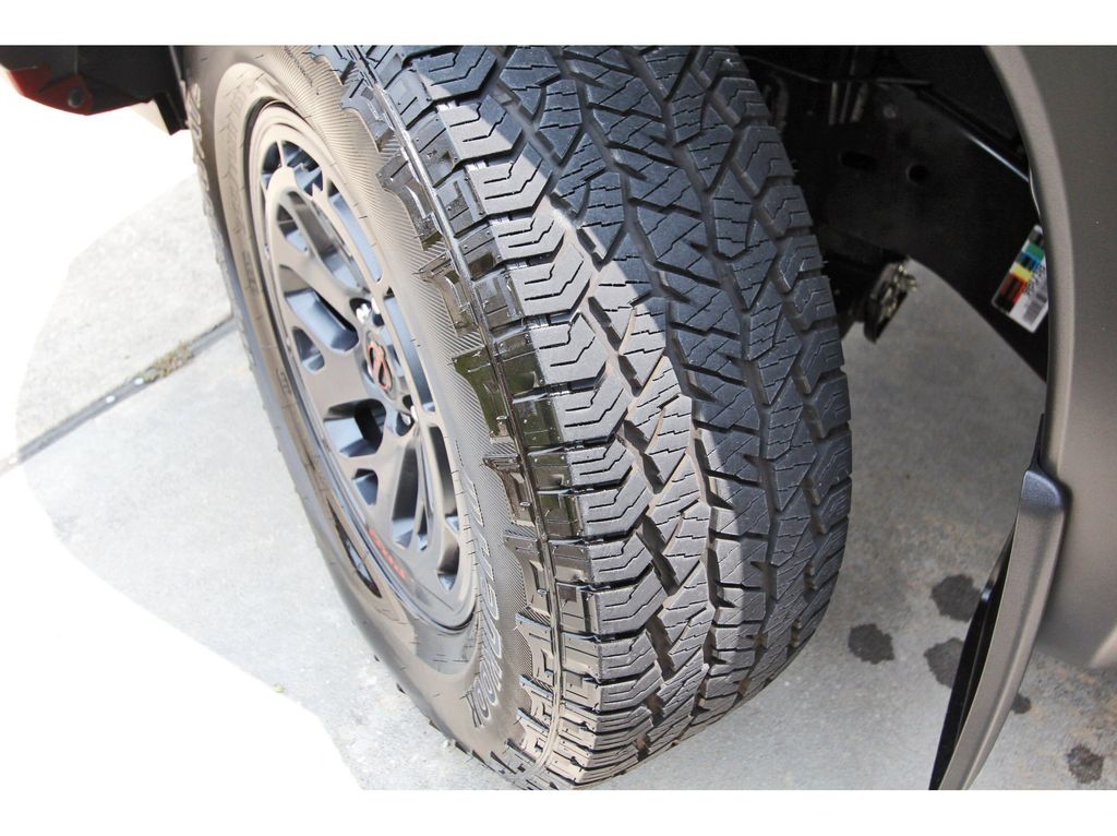 2025 Nissan Frontier PRO-4X Red at Bravo Nissan