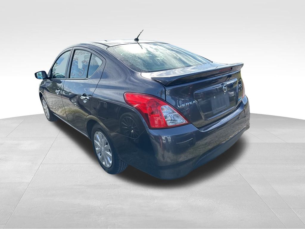 2015 Amethyst Gray Nissan Versa 1.6 SV FWD Sedan