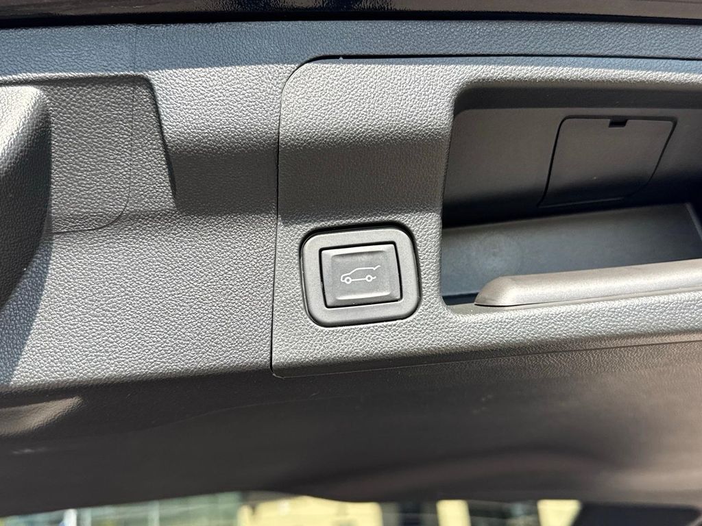 Used 2023 Ebony Twilight Metallic GMC AT4 image 6