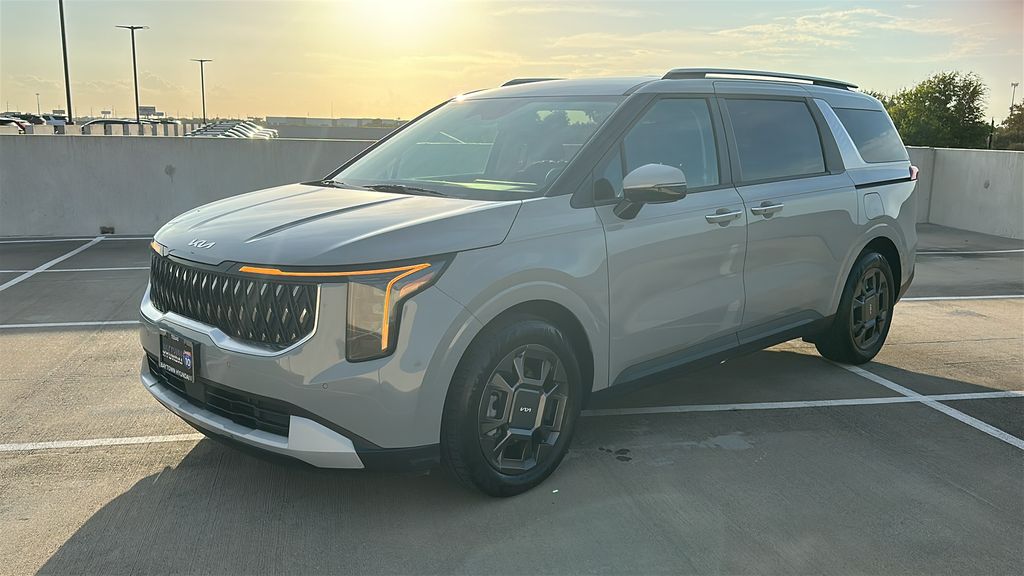 2026 Kia Carnival Hybrid EX White at Shottenkirk Kia Fort Bend