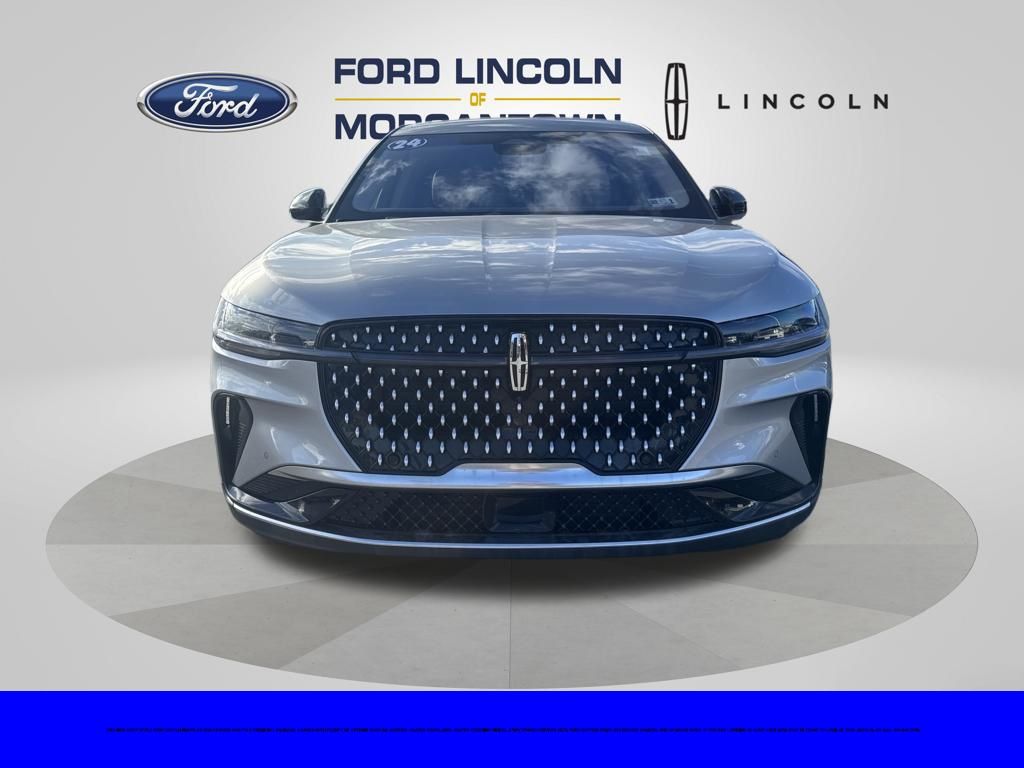 View vehicle photo 3