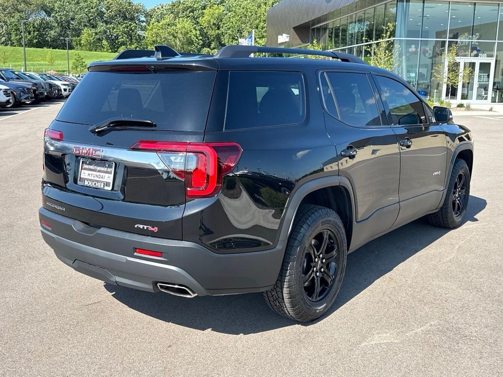 Used 2023 Ebony Twilight Metallic GMC AT4 image 4