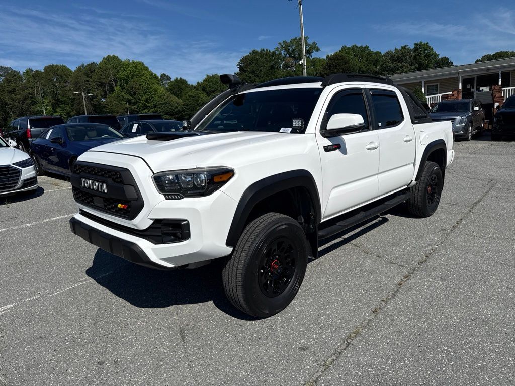 Super White 2019 Toyota Tacoma Pickup Truck Four-Wheel Drive 6-Speed Manual