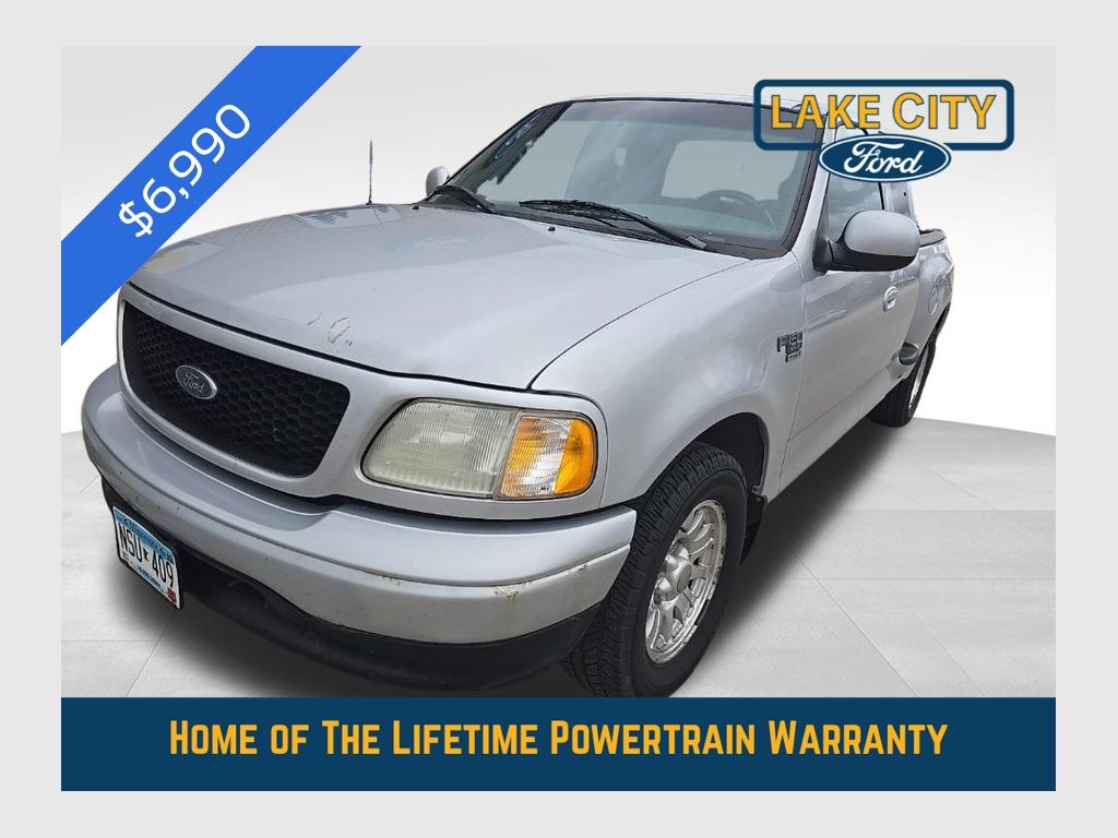 Silver Clearcoat Metallic 2002 Ford F-150 XLT SuperCab Stepside SB Pickup Truck Rear-Wheel Drive 4-Speed Automatic Overdrive