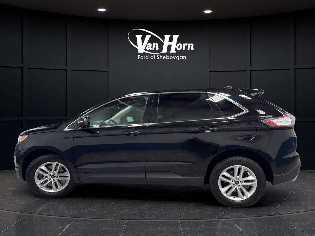 Used 2018 Shadow Black Ford SEL image 4