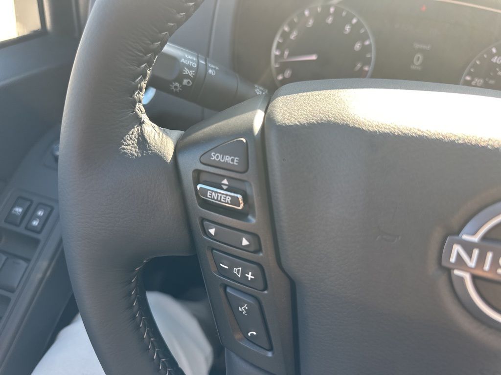 2025 Glacier White Nissan Frontier SV 4X4 Truck
