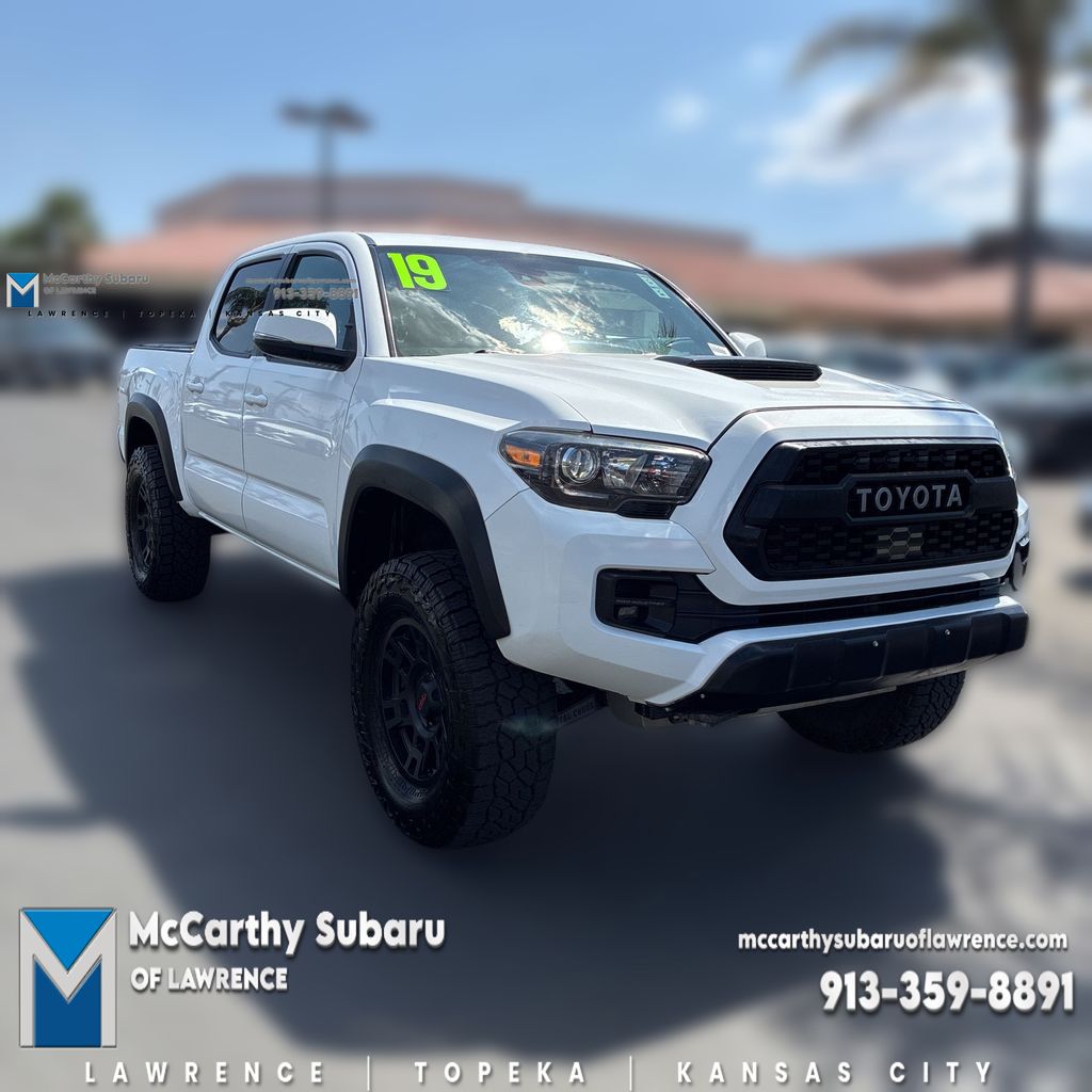Super White 2019 Toyota Tacoma Pickup Truck Four-Wheel Drive 6-Speed Automatic