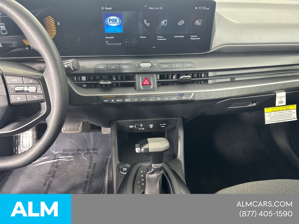 Used 2025 White Kia LXS image 32