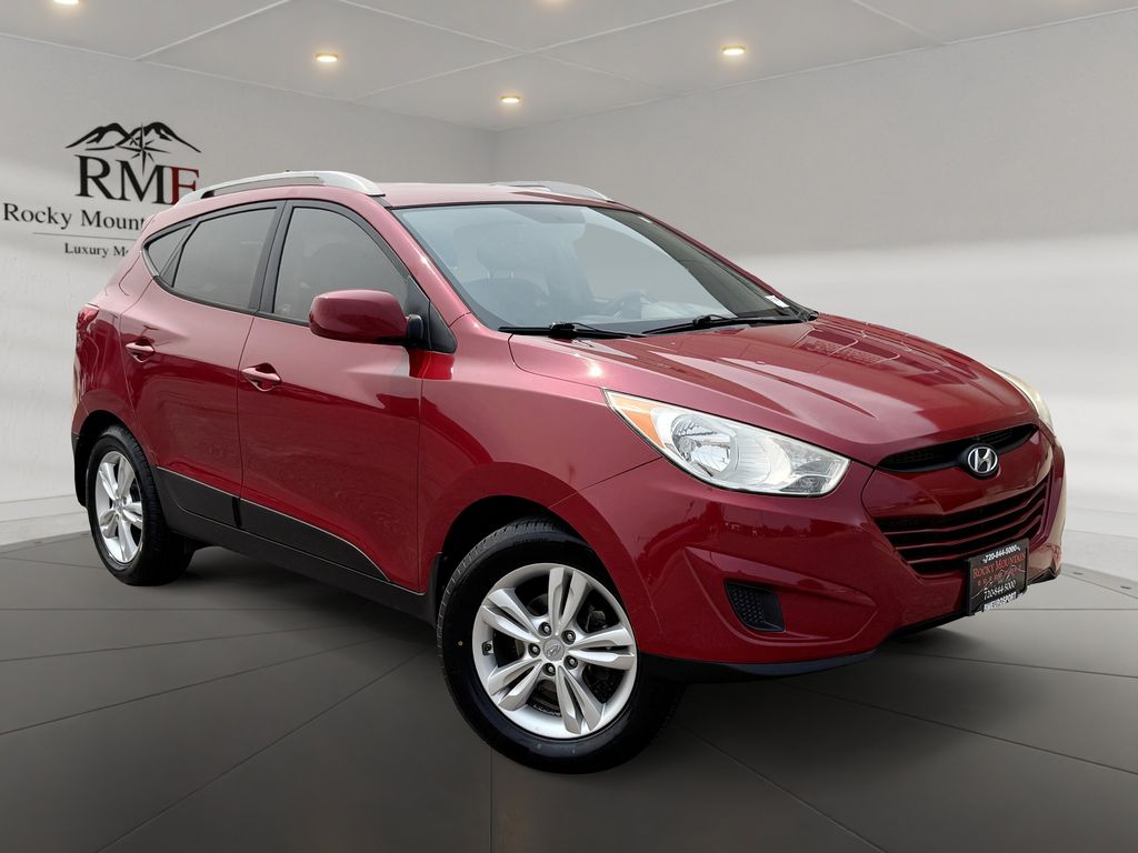Garnet Red 2011 Hyundai Tucson SUV / Crossover Front-Wheel Drive 6-Speed Automatic Overdrive