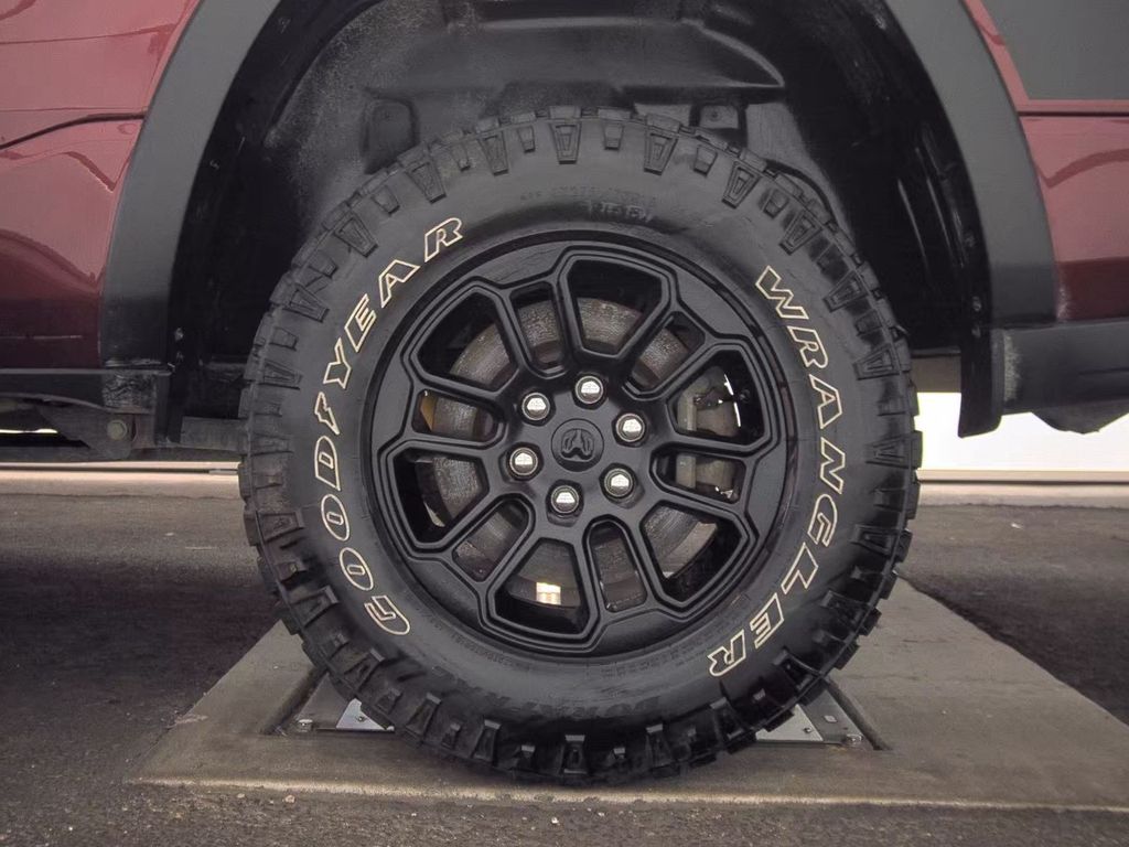 2025 Delmonico Red Pearlcoat Ram 1500 Rebel 4X4 Truck