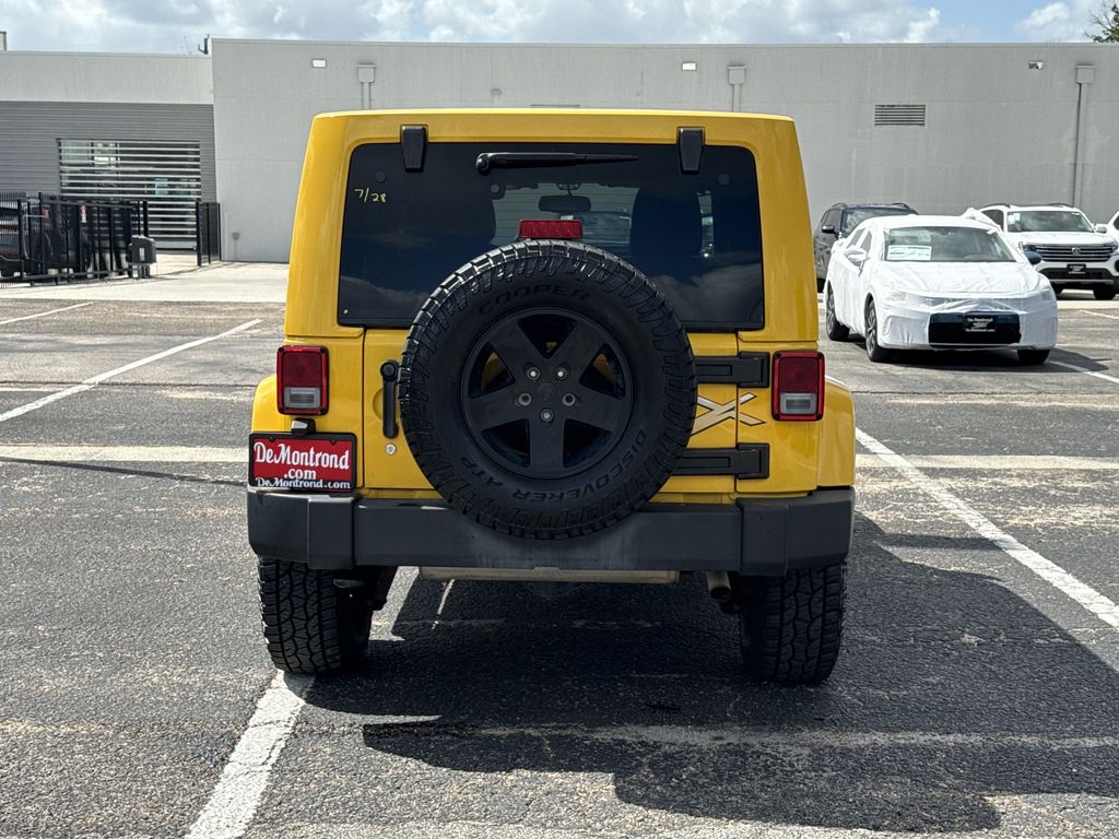 2015 Jeep Wrangler Unlimited Sahara Yellow at Parkway Family Mazda