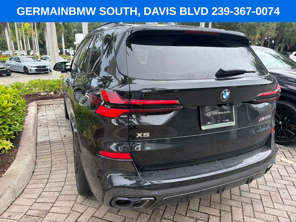 Certified Used 2025 Black BMW M60i image 12