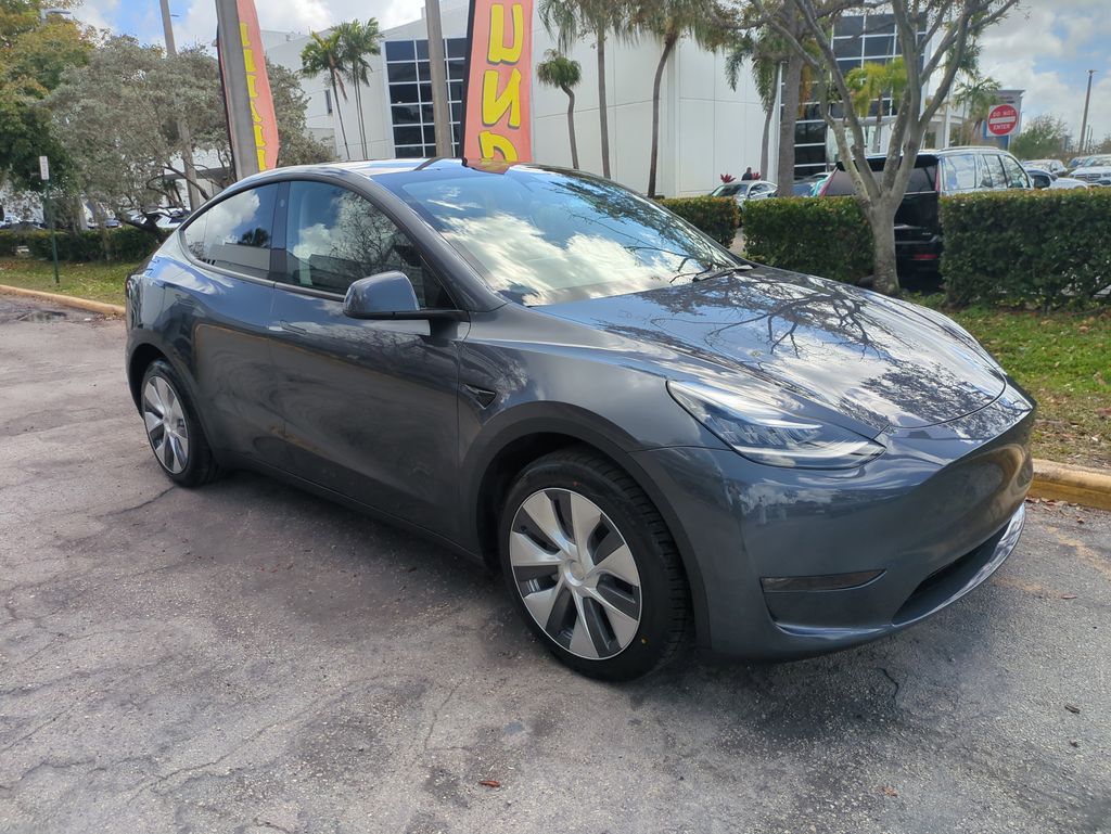 Used 2023 Tesla Model Y Long Range with VIN 7SAYGDEE0PA034199 for sale in Tamarac, FL