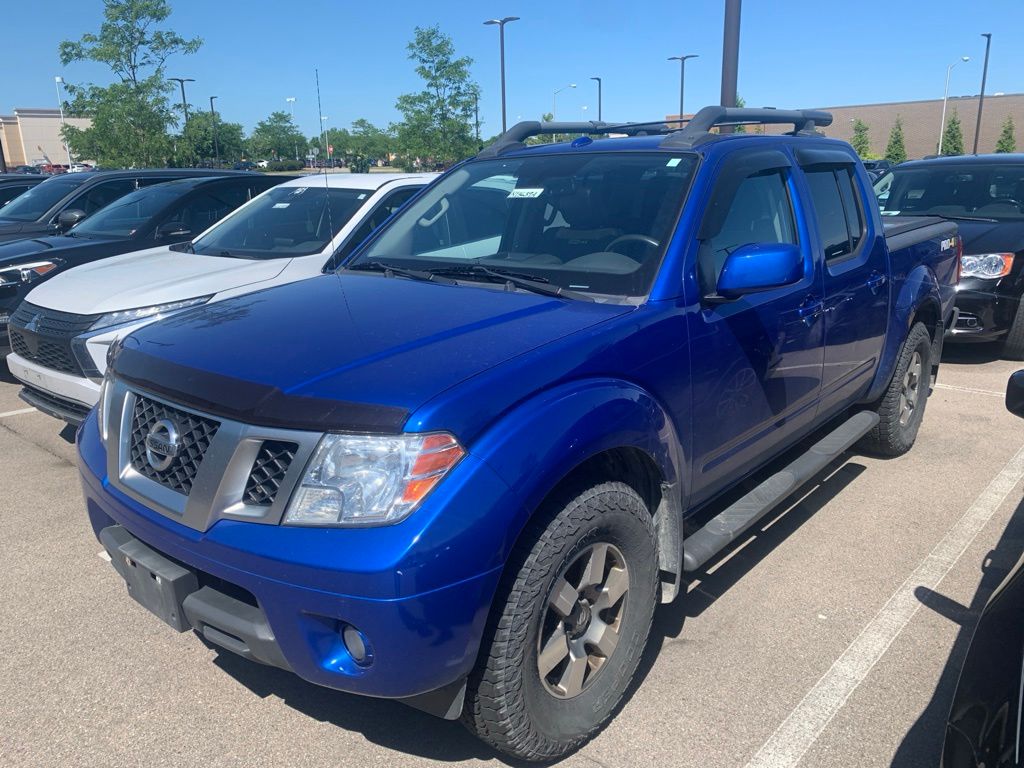 Blue Metallic 2013 Nissan Frontier Pickup Truck Four-Wheel Drive 5-Speed Automatic Overdrive