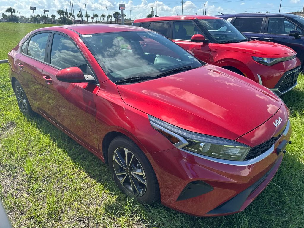 2024 Kia Forte LXS Red at DeMontrond Auto Country