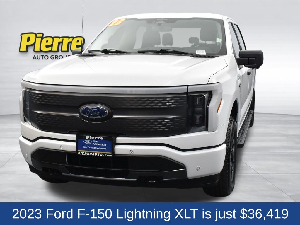 Oxford White 2023 Ford F-150 Lightning XLT SuperCrew AWD Pickup Truck All-Wheel Drive Automatic