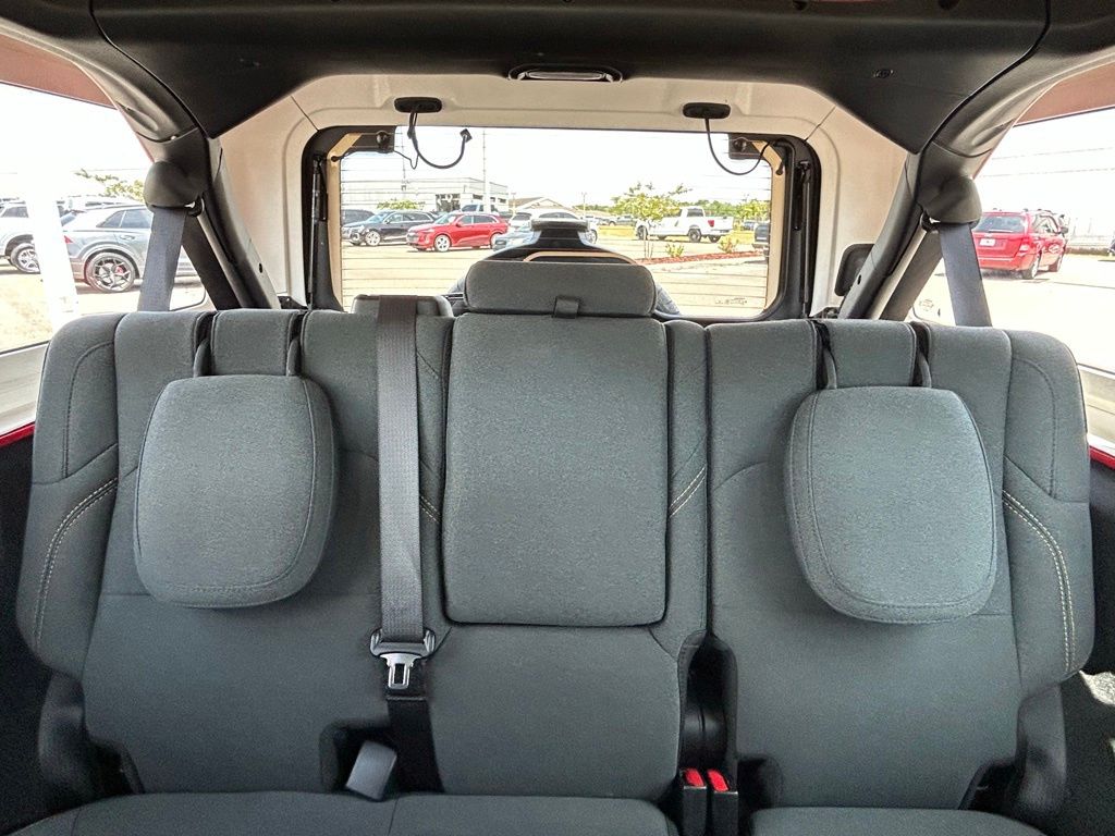 Used 2025 Firecracker Red Clearcoat Jeep Sahara 4xe image 12