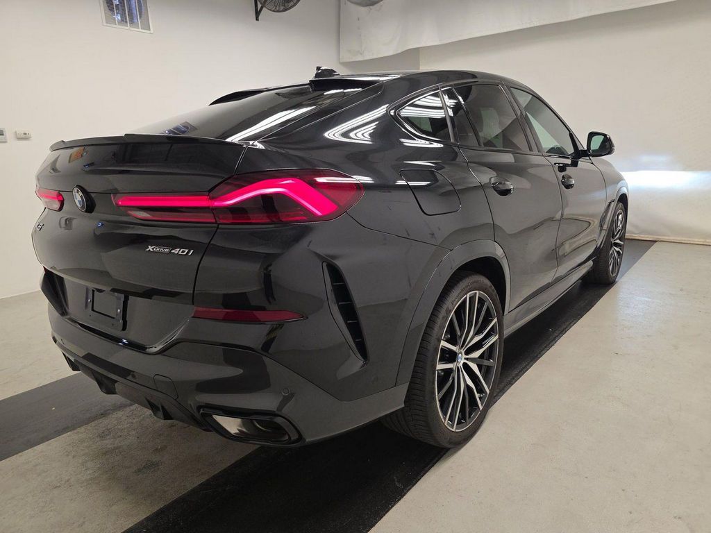 Used 2023 Black BMW xDrive40i image 4
