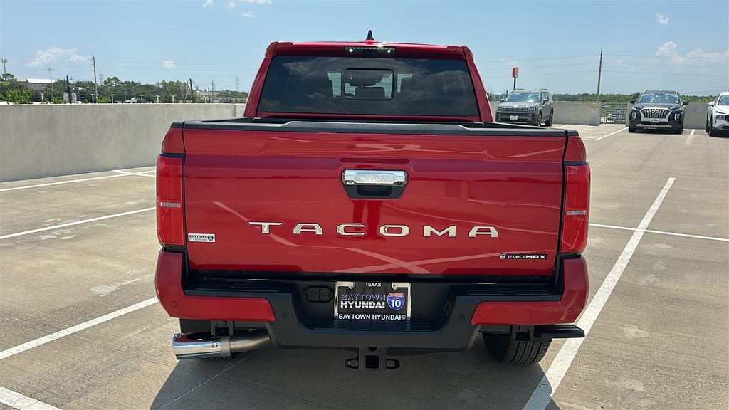 2026 Toyota Tacoma Hybrid Limited Red at EAG Ford Navasota