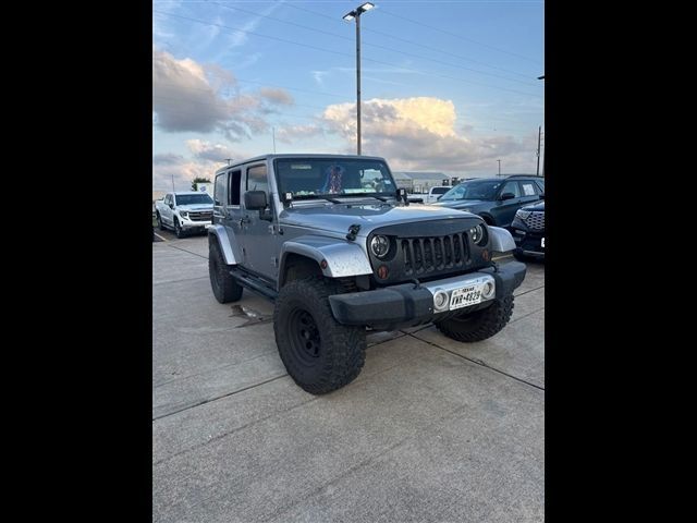 2013 Jeep Wrangler Unlimited Sahara Silver at Emmons Autoplex