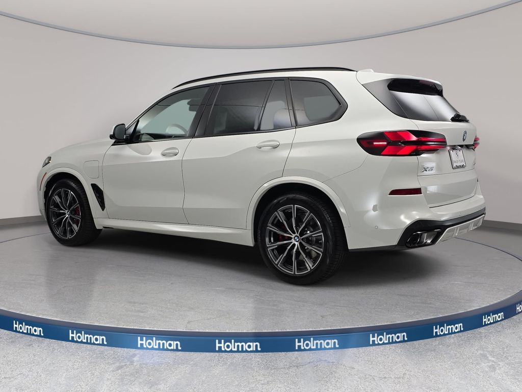 New 2026 Alpine White BMW xDrive50e image 7