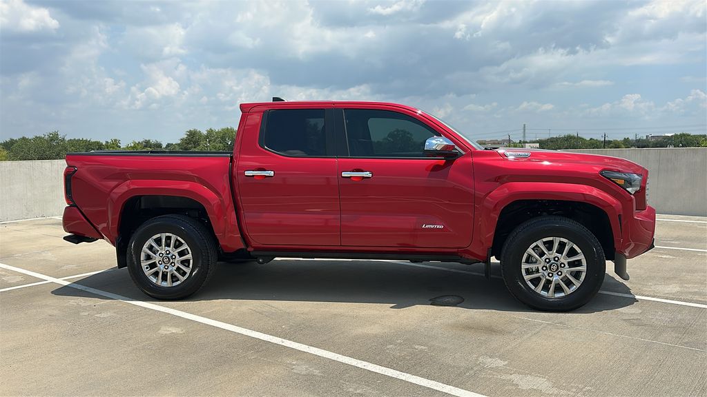 2026 Toyota Tacoma Hybrid Limited Red at EAG Ford Navasota