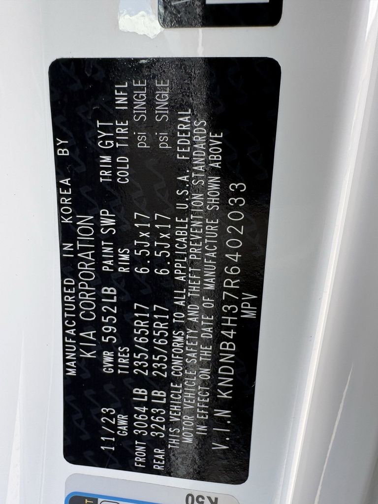 Used 2024 Snow White Pearl Kia LX image 27