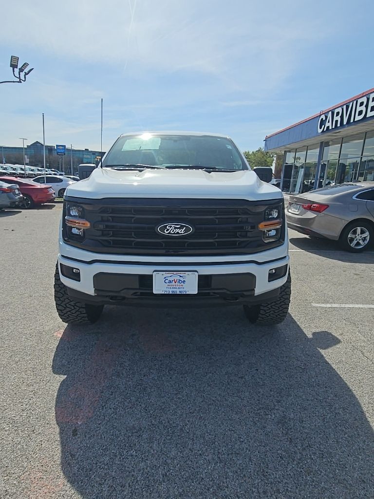 View vehicle photo 3