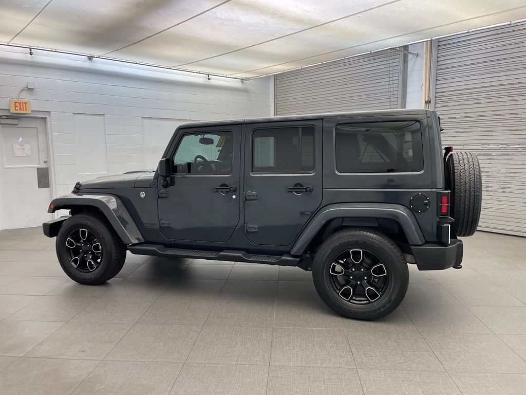 Used 2018 Black Jeep Unlimited Sahara image 8