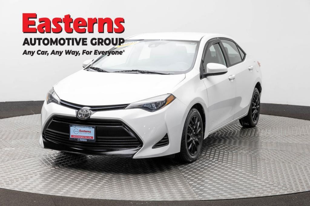Super White 2019 Toyota Corolla Sedan Front-Wheel Drive Continuously Variable Transmission