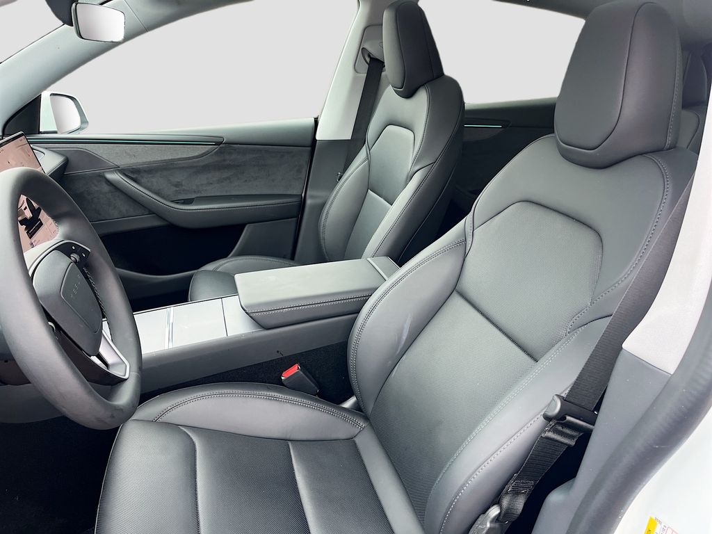 2026 Tesla Model Y Long Range White at AutoSavvy Houston Northwest