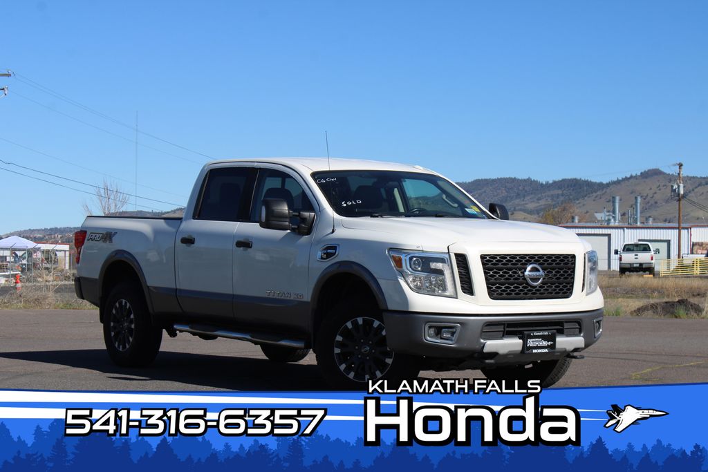 Pearl White 2018 Nissan Titan Pickup Truck Four-Wheel Drive 6-Speed Automatic