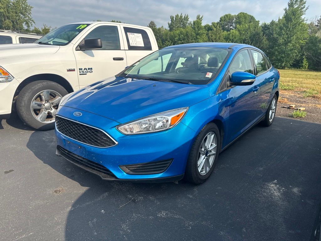 Blue Candy 2016 Ford Focus Sedan Front-Wheel Drive Automatic
