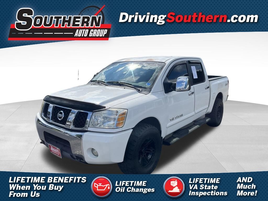 White 2005 Nissan Titan Pickup Truck Four-Wheel Drive 5-Speed Automatic