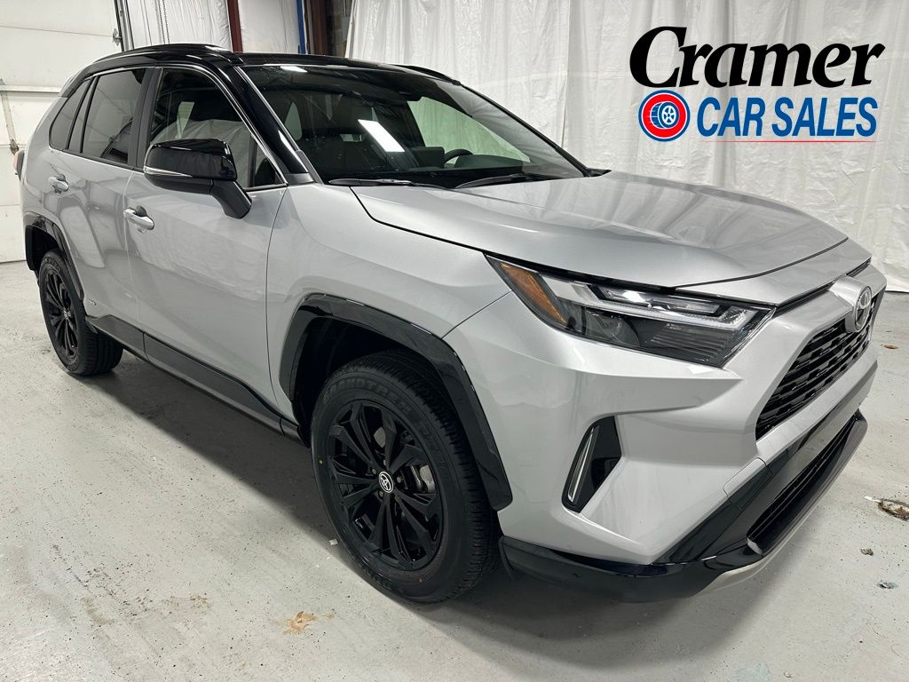 Silver Sky Metallic/Midnight Black Metallic 2025 Toyota RAV4 Hybrid XSE AWD SUV / Crossover All-Wheel Drive Continuously Variable Transmission