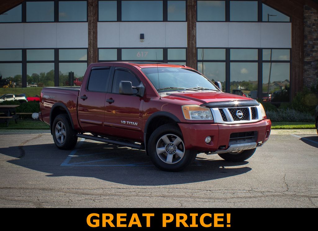 Cayenne Red Metallic 2013 Nissan Titan Pickup Truck Four-Wheel Drive 5-Speed Automatic
