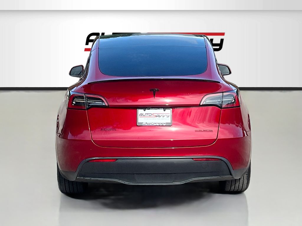 2025 Tesla Model Y Long Range Red at AutoSavvy Houston Northwest